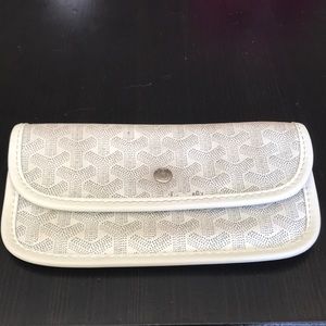 White Goyard wallet pouch.
